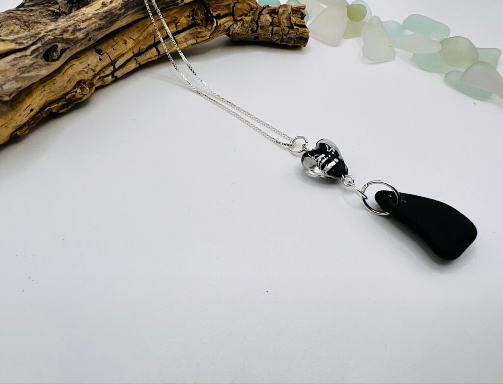 image for the item Heart Pendant Necklace | Sterling Silver Chain | Isle of Wight Black Sea Glass from Shell On The Beach